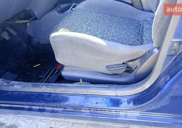 Синий Дэу Ланос, объемом двигателя 0 л и пробегом 180 тыс. км за 2400 $, фото 7 на Automoto.ua