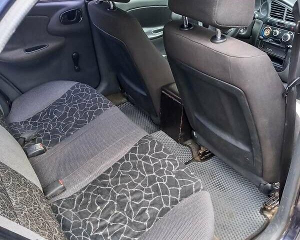 Синий Дэу Ланос, объемом двигателя 1.5 л и пробегом 270 тыс. км за 1200 $, фото 11 на Automoto.ua