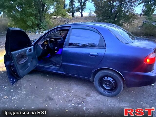 Синий Дэу Ланос, объемом двигателя 1.5 л и пробегом 312 тыс. км за 2100 $, фото 4 на Automoto.ua