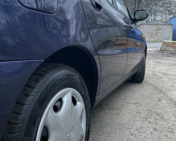 Синій Деу Ланос, об'ємом двигуна 1.5 л та пробігом 76 тис. км за 2850 $, фото 18 на Automoto.ua