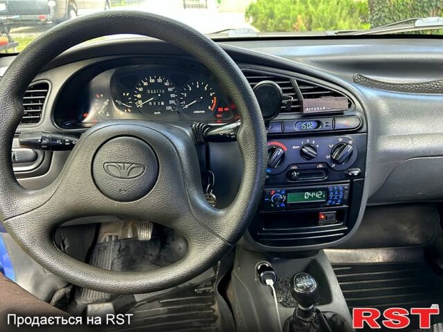 Синий Дэу Ланос, объемом двигателя 1.5 л и пробегом 143 тыс. км за 2750 $, фото 3 на Automoto.ua