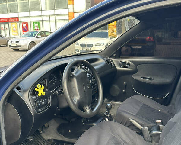 Синий Дэу Ланос, объемом двигателя 1.5 л и пробегом 145 тыс. км за 1899 $, фото 11 на Automoto.ua