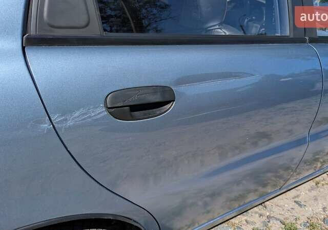 Синий Дэу Ланос, объемом двигателя 1.5 л и пробегом 400 тыс. км за 1900 $, фото 17 на Automoto.ua