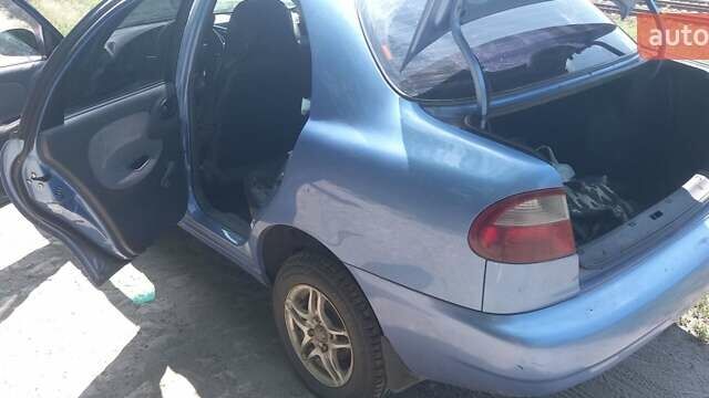 Синій Деу Ланос, об'ємом двигуна 1.39 л та пробігом 92 тис. км за 2500 $, фото 12 на Automoto.ua