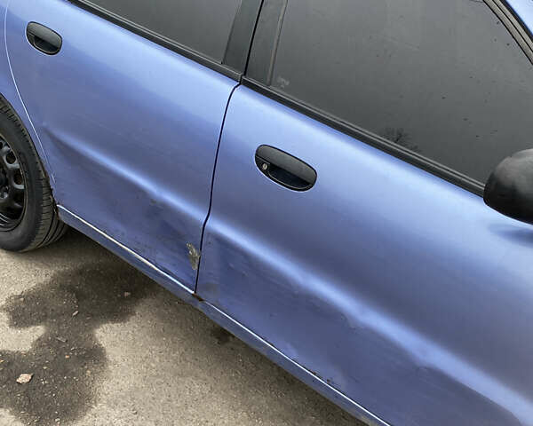 Синий Дэу Ланос, объемом двигателя 1.5 л и пробегом 311 тыс. км за 950 $, фото 3 на Automoto.ua