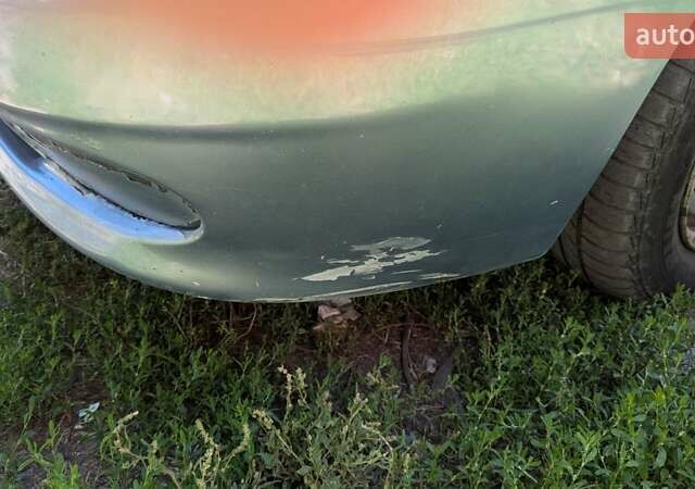 Синий Дэу Ланос, объемом двигателя 1.5 л и пробегом 400 тыс. км за 1900 $, фото 6 на Automoto.ua