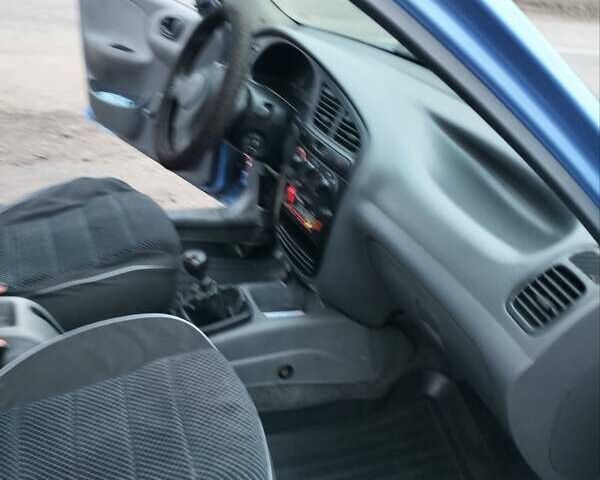 Синій Деу Ланос, об'ємом двигуна 1.5 л та пробігом 78 тис. км за 2800 $, фото 3 на Automoto.ua