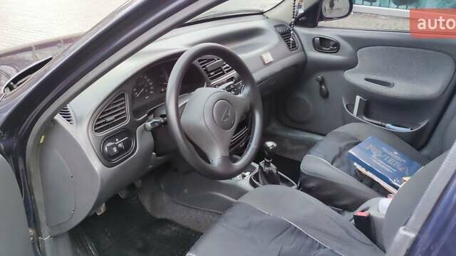 Синий Дэу Ланос, объемом двигателя 1.5 л и пробегом 194 тыс. км за 2593 $, фото 6 на Automoto.ua