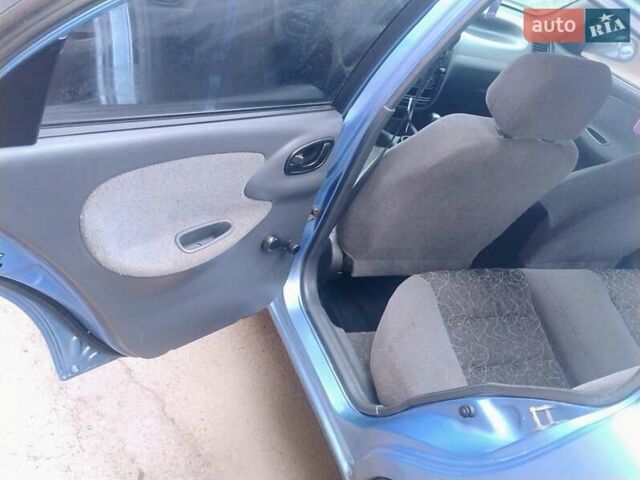 Синій Деу Ланос, об'ємом двигуна 1.5 л та пробігом 215 тис. км за 2200 $, фото 10 на Automoto.ua