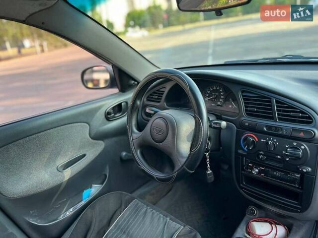 Синий Дэу Ланос, объемом двигателя 1.39 л и пробегом 161 тыс. км за 2299 $, фото 8 на Automoto.ua