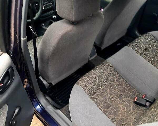 Синій Деу Ланос, об'ємом двигуна 1.5 л та пробігом 220 тис. км за 2000 $, фото 1 на Automoto.ua