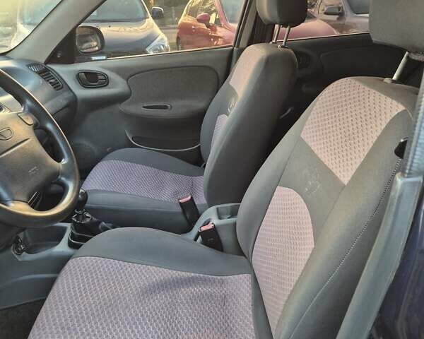 Синий Дэу Ланос, объемом двигателя 1.6 л и пробегом 125 тыс. км за 1600 $, фото 17 на Automoto.ua