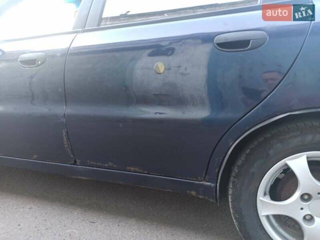 Синій Деу Ланос, об'ємом двигуна 1.5 л та пробігом 280 тис. км за 1850 $, фото 12 на Automoto.ua