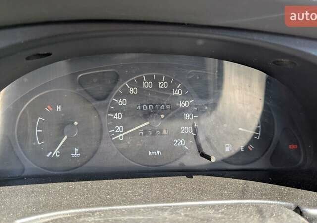 Синий Дэу Ланос, объемом двигателя 1.5 л и пробегом 400 тыс. км за 1900 $, фото 2 на Automoto.ua