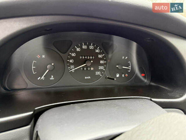 Синий Дэу Ланос, объемом двигателя 1.3 л и пробегом 224 тыс. км за 1490 $, фото 11 на Automoto.ua