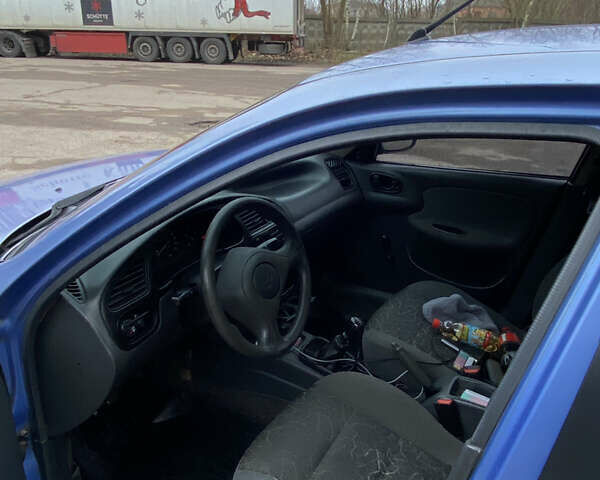 Синий Дэу Ланос, объемом двигателя 1.5 л и пробегом 311 тыс. км за 950 $, фото 8 на Automoto.ua