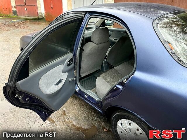 Синій Деу Ланос, об'ємом двигуна 1.5 л та пробігом 245 тис. км за 1650 $, фото 3 на Automoto.ua