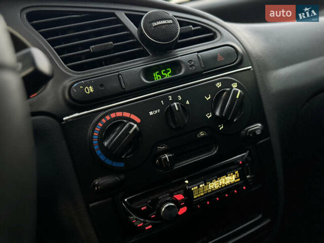 Синій Деу Ланос, об'ємом двигуна 1.5 л та пробігом 153 тис. км за 1850 $, фото 19 на Automoto.ua