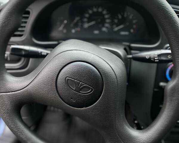 Синий Дэу Ланос, объемом двигателя 1.5 л и пробегом 215 тыс. км за 2350 $, фото 13 на Automoto.ua