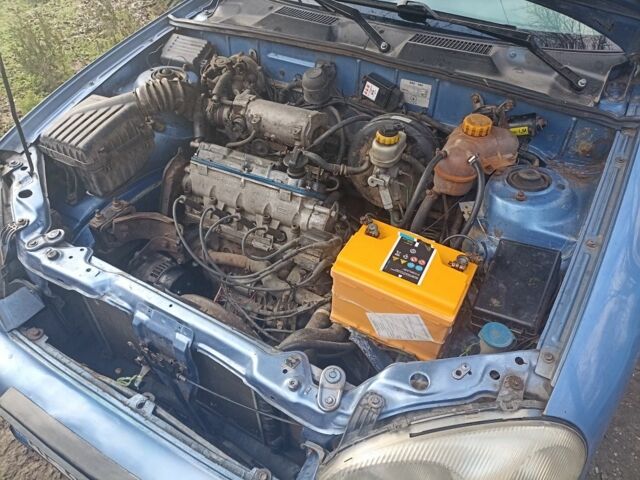 Синий Дэу Ланос, объемом двигателя 1.4 л и пробегом 223 тыс. км за 1066 $, фото 6 на Automoto.ua