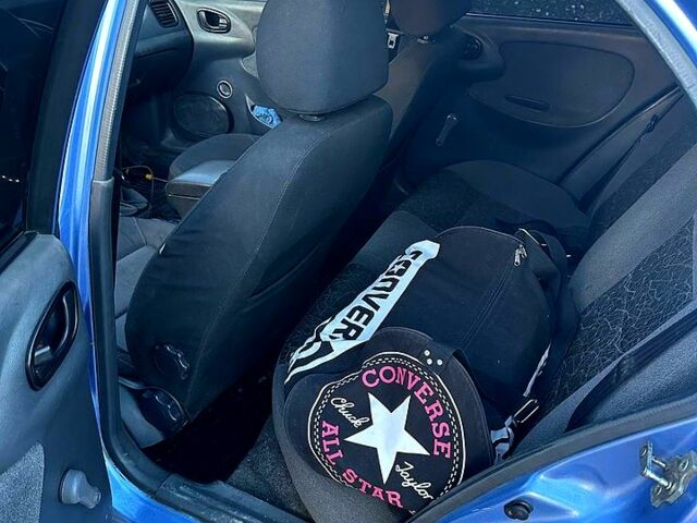 Синій Деу Ланос, об'ємом двигуна 1.4 л та пробігом 250 тис. км за 2000 $, фото 2 на Automoto.ua