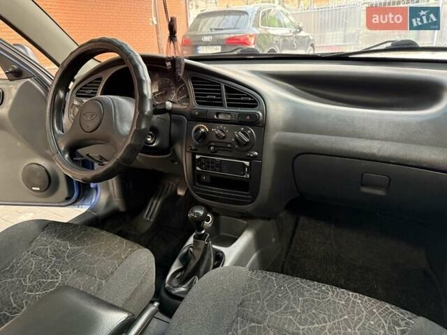 Синій Деу Ланос, об'ємом двигуна 1.5 л та пробігом 240 тис. км за 2600 $, фото 29 на Automoto.ua