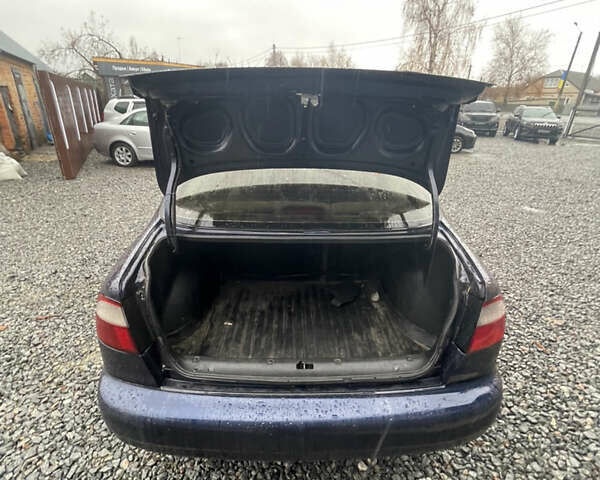 Синій Деу Ланос, об'ємом двигуна 1.5 л та пробігом 250 тис. км за 1650 $, фото 5 на Automoto.ua