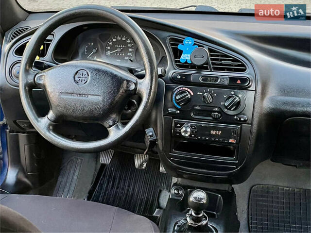 Синій Деу Ланос, об'ємом двигуна 1.5 л та пробігом 140 тис. км за 1450 $, фото 18 на Automoto.ua