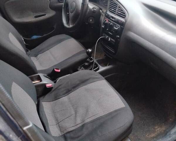 Синий Дэу Ланос, объемом двигателя 1.5 л и пробегом 295 тыс. км за 2400 $, фото 1 на Automoto.ua