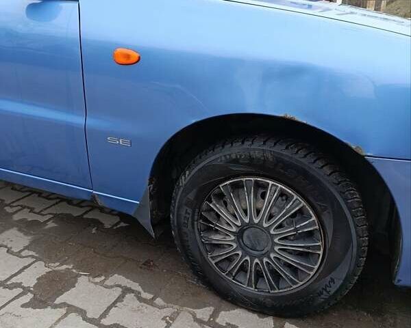 Синий Дэу Ланос, объемом двигателя 1.5 л и пробегом 189 тыс. км за 3400 $, фото 7 на Automoto.ua