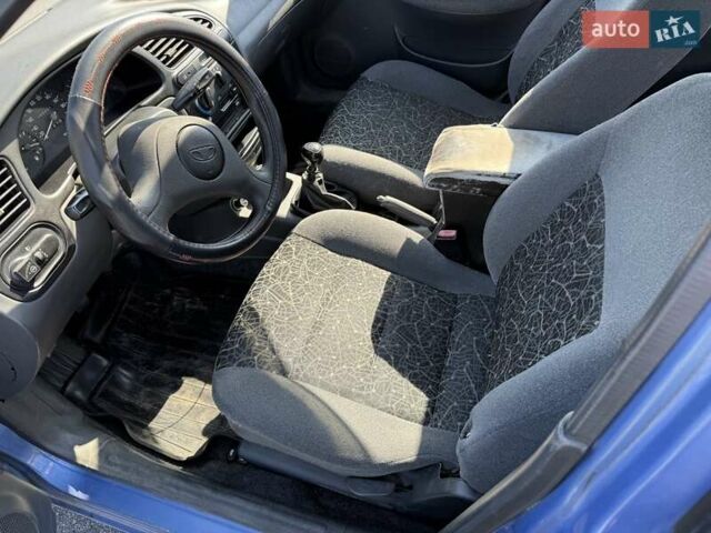 Синий Дэу Ланос, объемом двигателя 1.5 л и пробегом 256 тыс. км за 1550 $, фото 7 на Automoto.ua