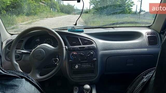 Синій Деу Ланос, об'ємом двигуна 1.39 л та пробігом 92 тис. км за 2500 $, фото 6 на Automoto.ua
