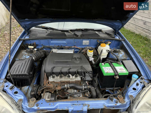 Синий Дэу Ланос, объемом двигателя 1.4 л и пробегом 224 тыс. км за 1390 $, фото 22 на Automoto.ua