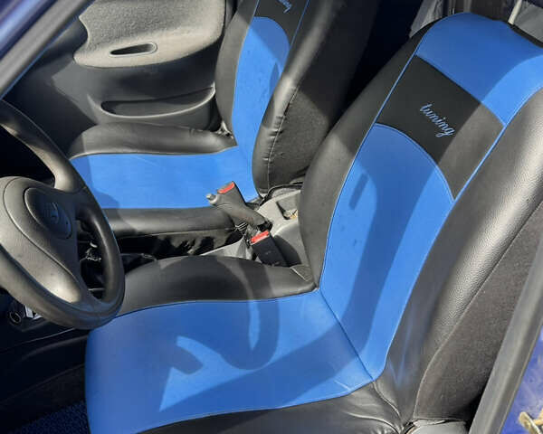 Синий Дэу Ланос, объемом двигателя 1.5 л и пробегом 250 тыс. км за 3600 $, фото 10 на Automoto.ua