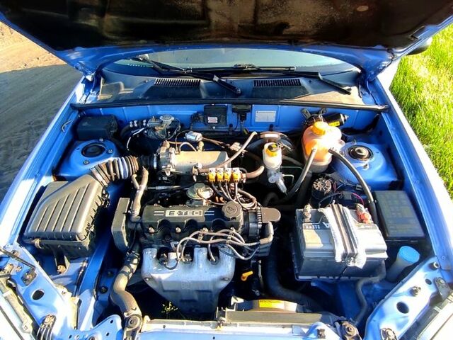 Синий Дэу Ланос, объемом двигателя 1.5 л и пробегом 97 тыс. км за 3500 $, фото 11 на Automoto.ua