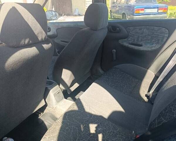 Синій Деу Ланос, об'ємом двигуна 1.5 л та пробігом 20 тис. км за 1700 $, фото 1 на Automoto.ua