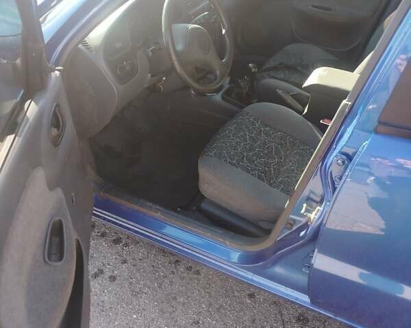 Деу Ланос 2007 у Миколаєві на Automoto.ua Синій Деу Ланос, об'ємом двигуна 1.5 л та пробігом 270 тис. км за 2700 $, фото 7 на Automoto.ua