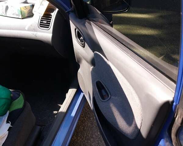 Синий Дэу Ланос, объемом двигателя 1.6 л и пробегом 135 тыс. км за 2000 $, фото 5 на Automoto.ua