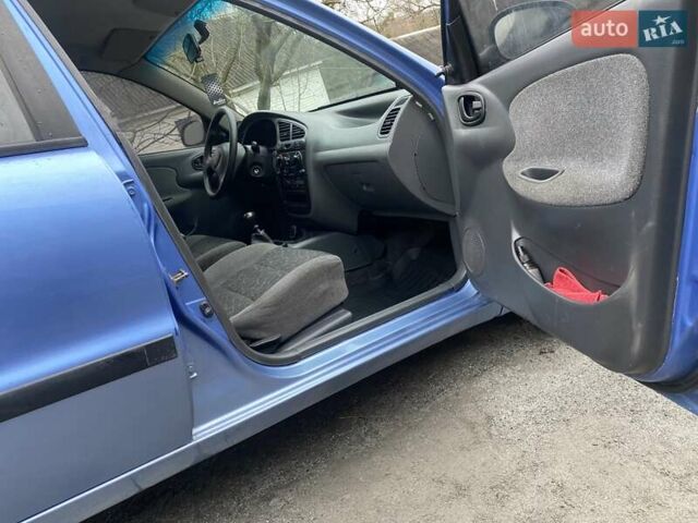 Синий Дэу Ланос, объемом двигателя 1.5 л и пробегом 215 тыс. км за 2350 $, фото 9 на Automoto.ua