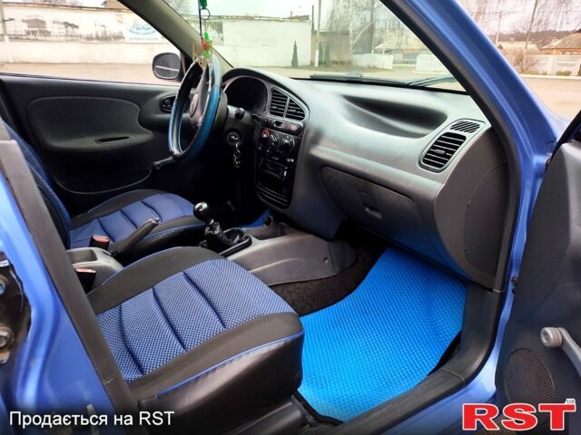 Синий Дэу Ланос, объемом двигателя 1.5 л и пробегом 193 тыс. км за 1850 $, фото 8 на Automoto.ua