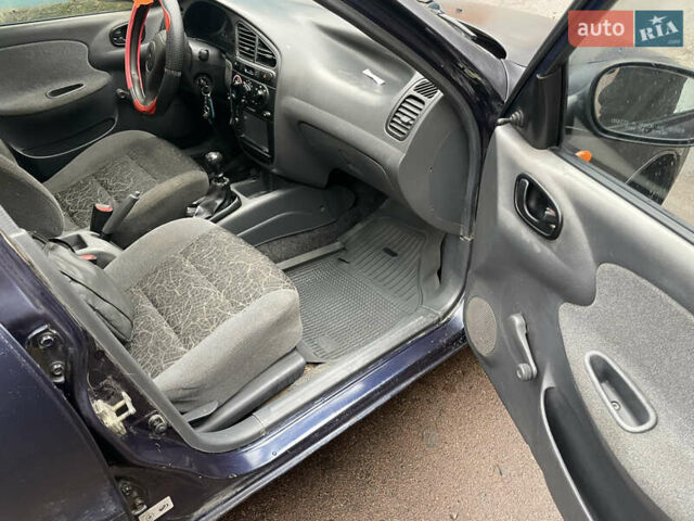 Синий Дэу Ланос, объемом двигателя 1.5 л и пробегом 245 тыс. км за 1650 $, фото 5 на Automoto.ua