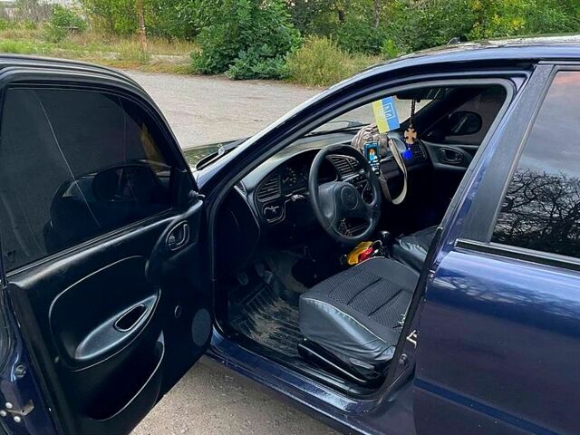 Синій Деу Ланос, об'ємом двигуна 1.5 л та пробігом 260 тис. км за 3100 $, фото 8 на Automoto.ua