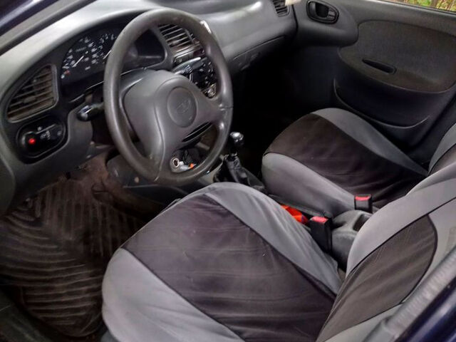 Синій Деу Ланос, об'ємом двигуна 1.5 л та пробігом 187 тис. км за 2000 $, фото 1 на Automoto.ua