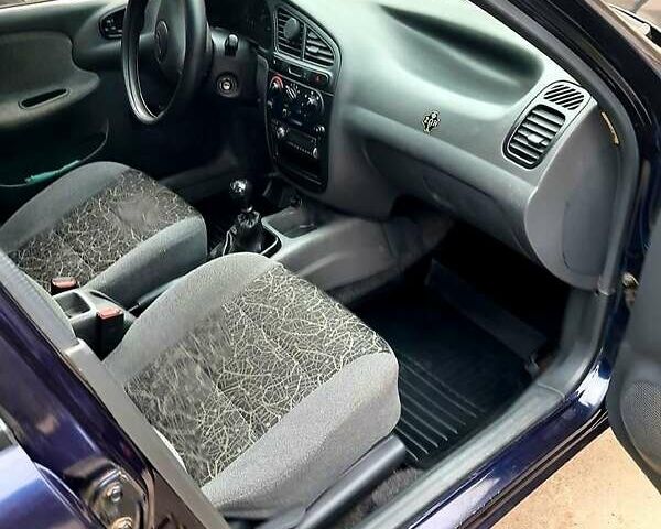 Синій Деу Ланос, об'ємом двигуна 1.5 л та пробігом 220 тис. км за 2000 $, фото 4 на Automoto.ua