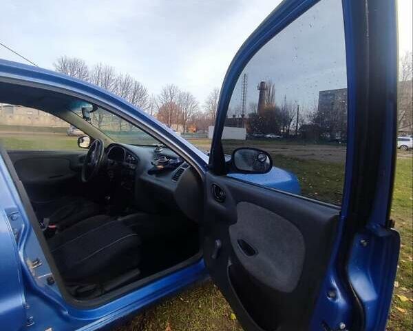 Синій Деу Ланос, об'ємом двигуна 1.5 л та пробігом 188 тис. км за 2000 $, фото 6 на Automoto.ua