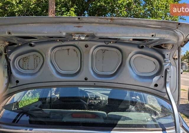 Синий Дэу Ланос, объемом двигателя 1.5 л и пробегом 400 тыс. км за 1900 $, фото 14 на Automoto.ua