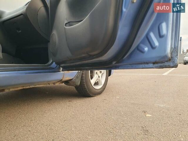 Синий Дэу Ланос, объемом двигателя 1.6 л и пробегом 239 тыс. км за 1800 $, фото 13 на Automoto.ua