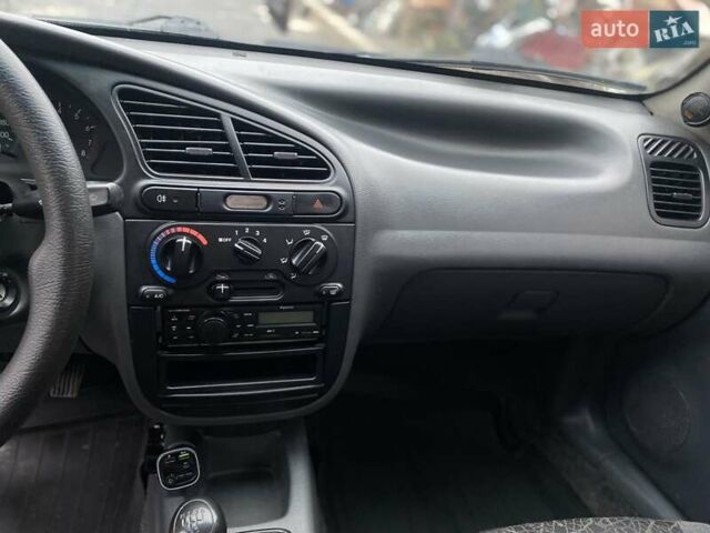 Синий Дэу Ланос, объемом двигателя 1.5 л и пробегом 215 тыс. км за 2350 $, фото 6 на Automoto.ua