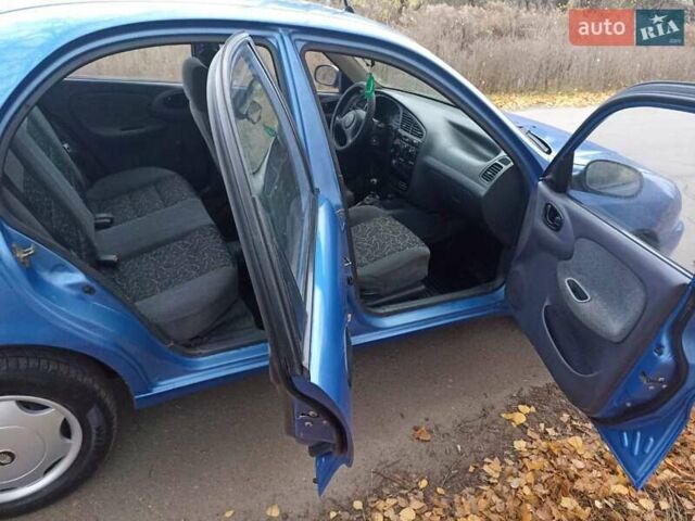 Синий Дэу Ланос, объемом двигателя 1.5 л и пробегом 240 тыс. км за 2550 $, фото 5 на Automoto.ua