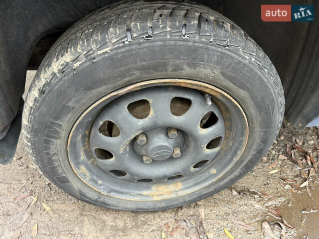 Синий Дэу Ланос, объемом двигателя 1.4 л и пробегом 224 тыс. км за 1390 $, фото 19 на Automoto.ua